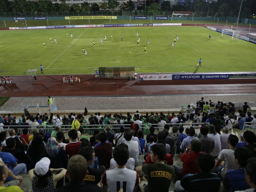 Football fans at an S League match. Starting this year, the Football Association of Singapore, which runs the S.League, will no longer get to control its own purse strings. Photo by Wee Teck Hian