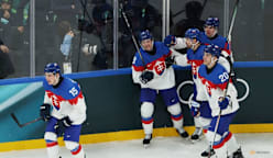 Ice hockey-Slovakia celebrate 'best loss' as they reach quarter-finals