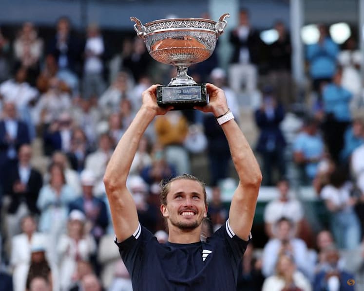 Zverev tears down the wall to enter Grand Slam winners' circle at French Open