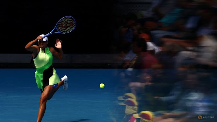 Defending champion Keys survives mid-set wobble to advance