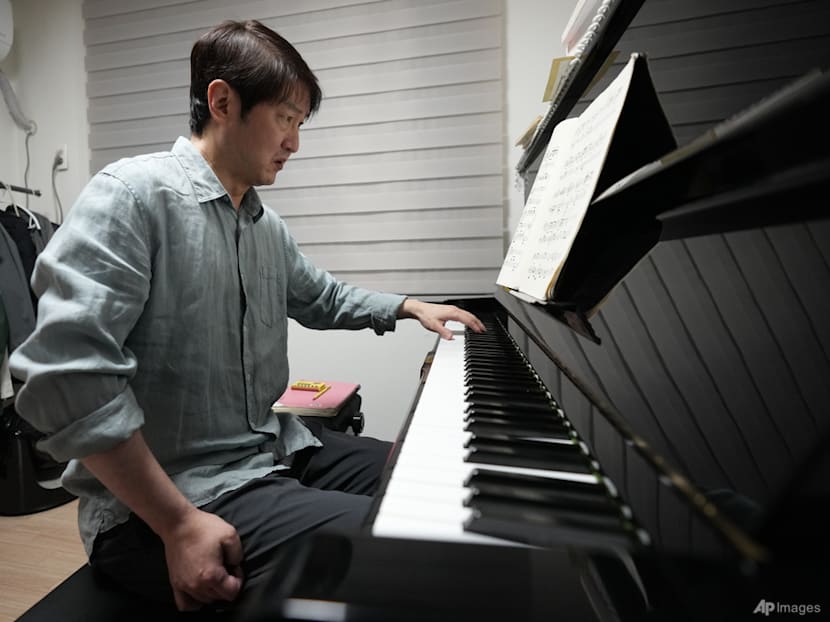 Pianist paralysed by stroke makes comeback with one hand, set for first orchestra performance