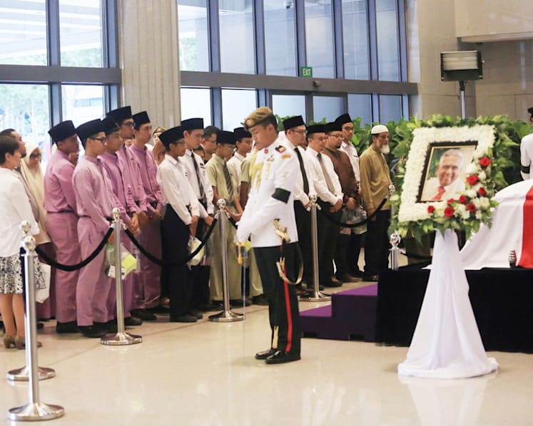 Thousands bid a final farewell to Nathan at Parliament House