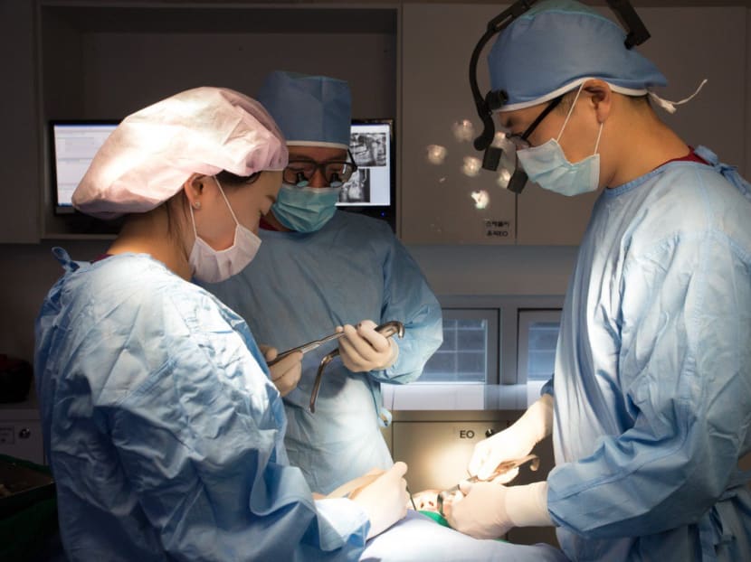 While many streets in Seoul have similar sights, one thing makes Gangnam stand out – almost every building in the district has a sign advertising a plastic surgery clinic.