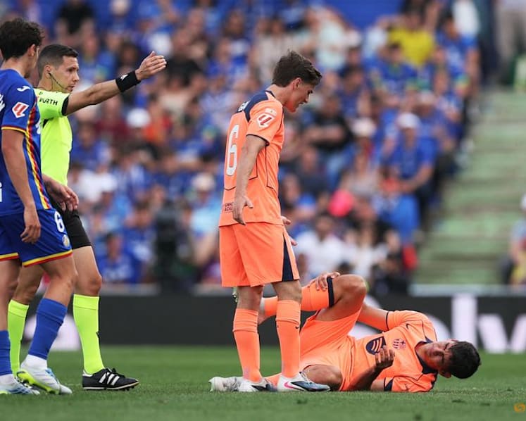 Barcelona march on towards title with 2-0 victory at Getafe