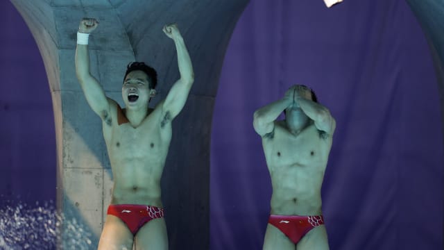 中国跳水好手展现实力 顺利挺进男子三米跳板半决赛