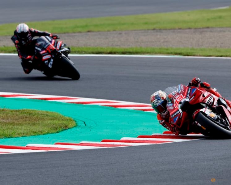Marquez wins Japanese GP to cut Martin's lead