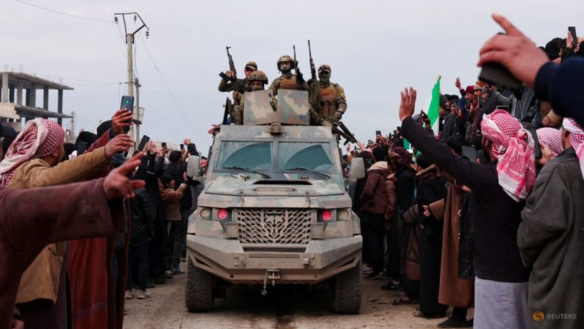 Syrian troops sweep northern towns as Kurdish fighters withdraw