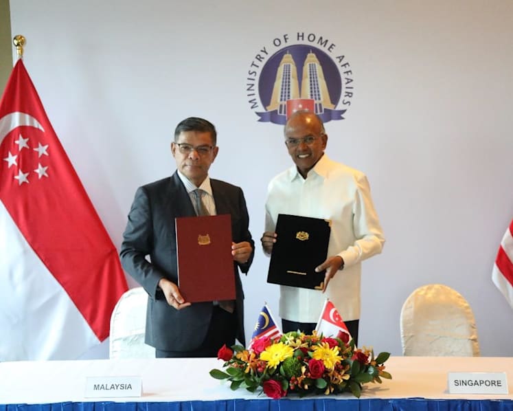 Singapore and Malaysia sign MOU to combat transnational crimes