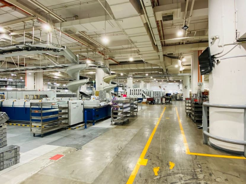 One of the tours gives participants a glimpse at the inner workings of the SingPost Distribution Centre where mail is sorted.