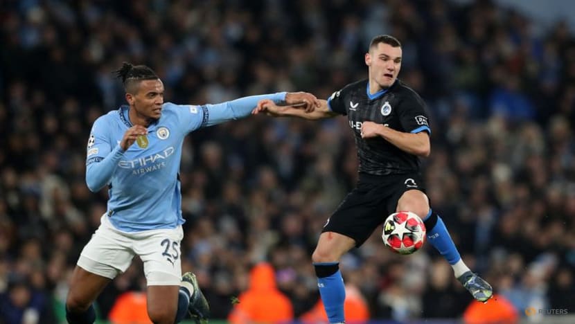 Man City scrape into Champions League knockouts with comeback win over Brugge Man City scrape into Champions League knockouts with comeback win over Brugge