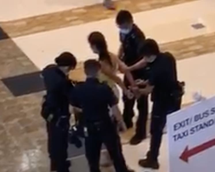 Woman arrested after she allegedly poured soup on stranger, spat at him and bit his arm