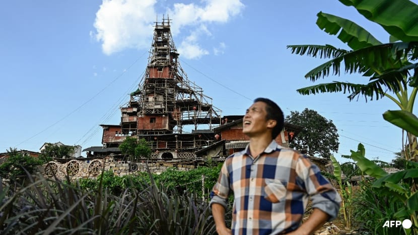 Chinese man defies demolition orders to build madcap rural home Chinese man defies demolition orders to build madcap rural home