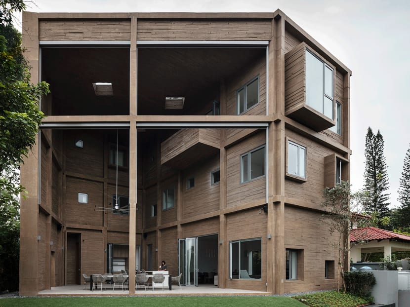 In this Singapore home, a family bonds over meals in a 3 storey-high patio with a view