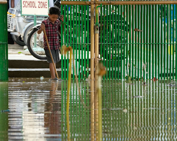 'We have to do something': Philippine schools, students grapple with floods as climate change forces them to adapt