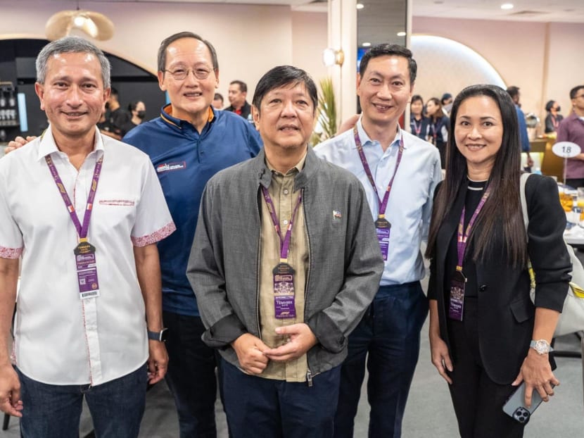 Philippine President Ferdinand Marcos Jr (front row, centre) with Singapore's Foreign Affairs Minister Vivian Balakrishnan (front row, left) and Manpower Minister Tan See Leng (back row, left), pictured at the Formula One race event in Singapore. Philippine President Ferdinand Marcos Jr (front row, centre) with Singapore's Foreign Affairs Minister Vivian Balakrishnan (front row, left) and Manpower Minister Tan See Leng (back row, left), pictured at the Formula One race event in Singapore.