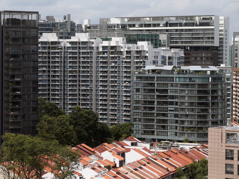This general view shows a private residential complex and the financial district in Singapore.