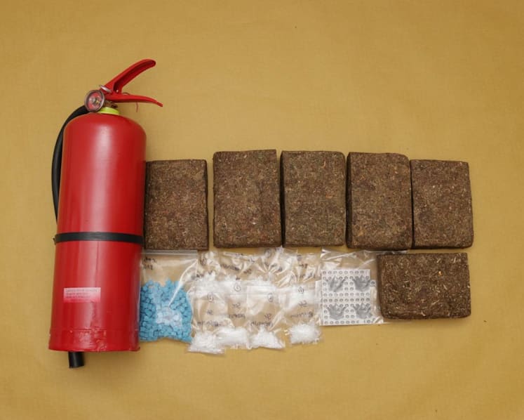 Cannabis hidden in fire extinguisher among 13kg of drugs seized in CNB raids