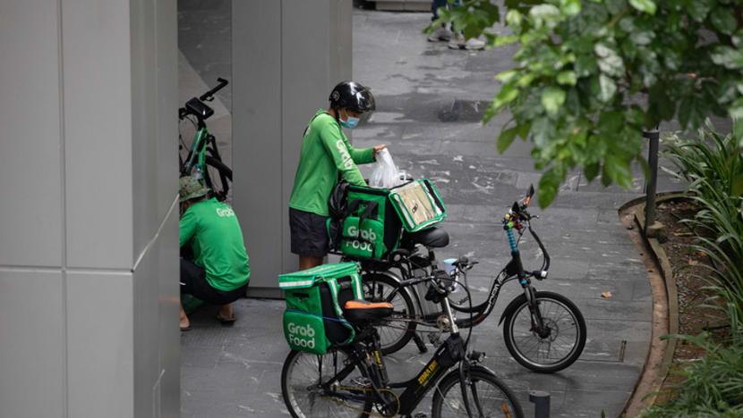 URA urges malls to have waiting bays for delivery riders, who say they often park illegally to save time