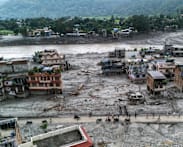 Rescuers dig into tunnel as missing toll from Nepal, China disaster nears 3,000