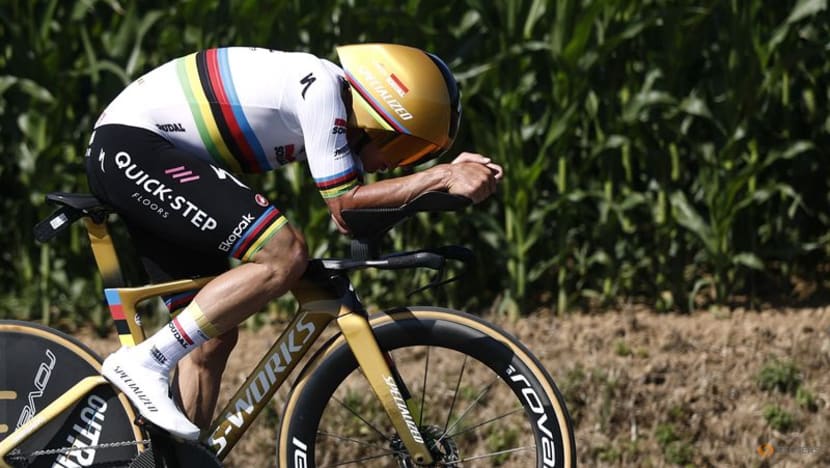 Evenepoel wins Tour time trial, Pogacar takes yellow jersey