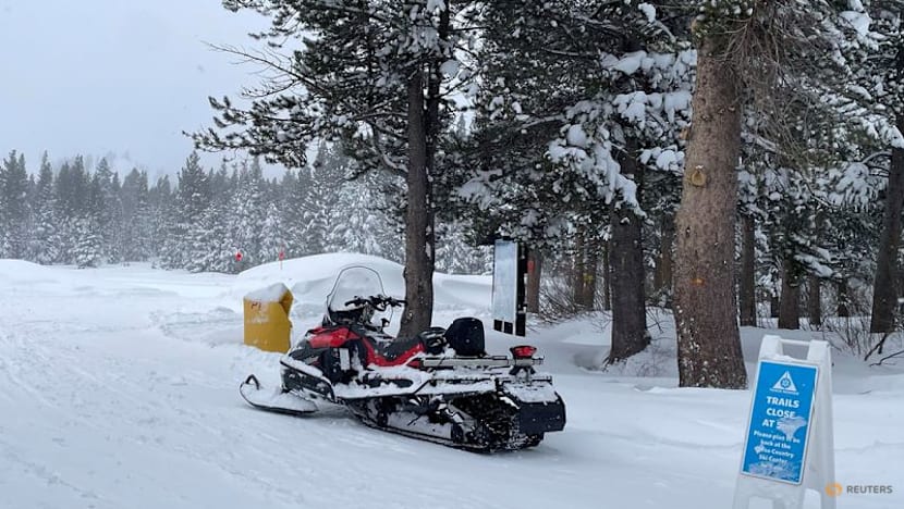 A snowmobile is parked at Alder Creek Adventure Centre, where search crews were launched to try to locate a group of missing skiers, in Truckee, California, US Feb 18, 2026.
