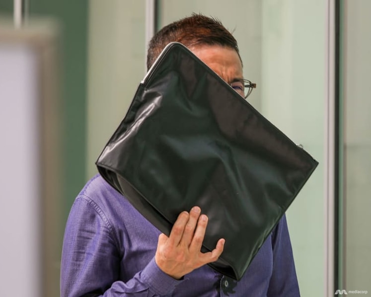  Former HDB director admits to taking obscene videos, photos of men