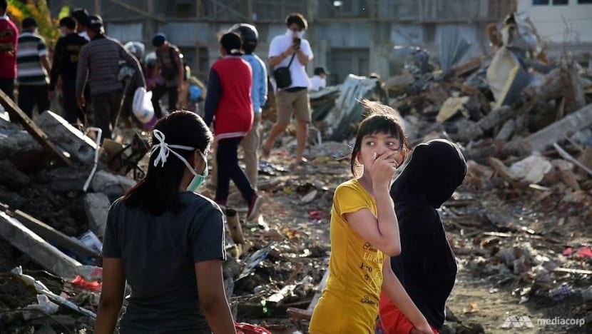 Despair fills Indonesia's buried village of Petobo as search for bodies draws to an end
