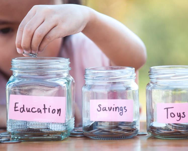 Beyond the piggy bank: How parents teach young children about money