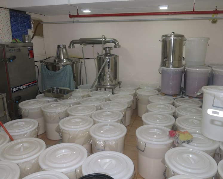 More than 670 bottles of illegally produced liquor seized; two men arrested 