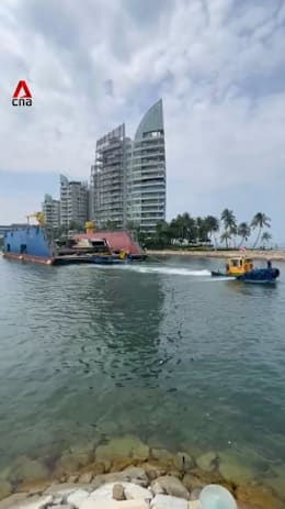 Luxury yacht destroyed by fire removed from Sentosa Cove