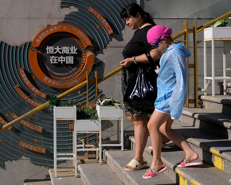 China tries to reassure on Evergrande as default fears rise
