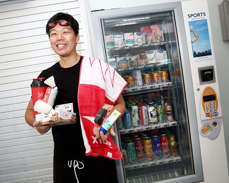This vending machine sells protein bars and shuttlecocks