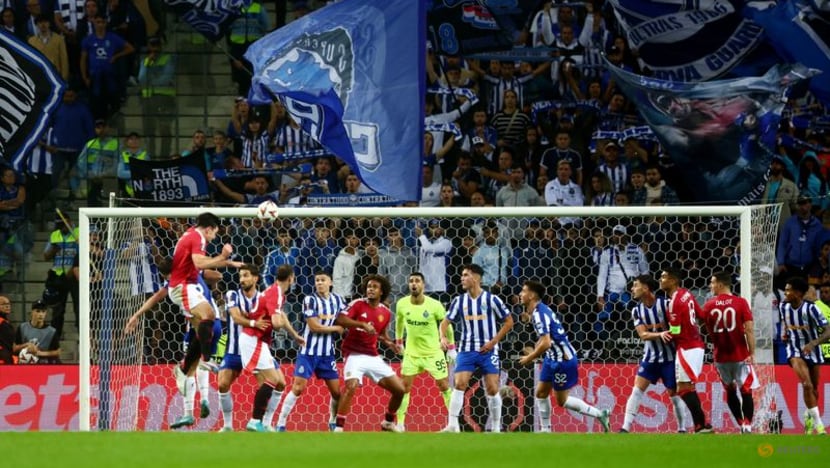 Maguire's late header earns Man United 3-3 draw at Porto Maguire's late header earns Man United 3-3 draw at Porto