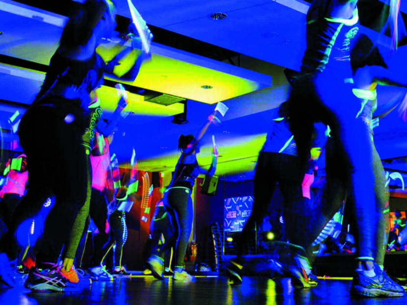 Fitness regimes are getting S'poreans to surf, bounce and wield a light saber