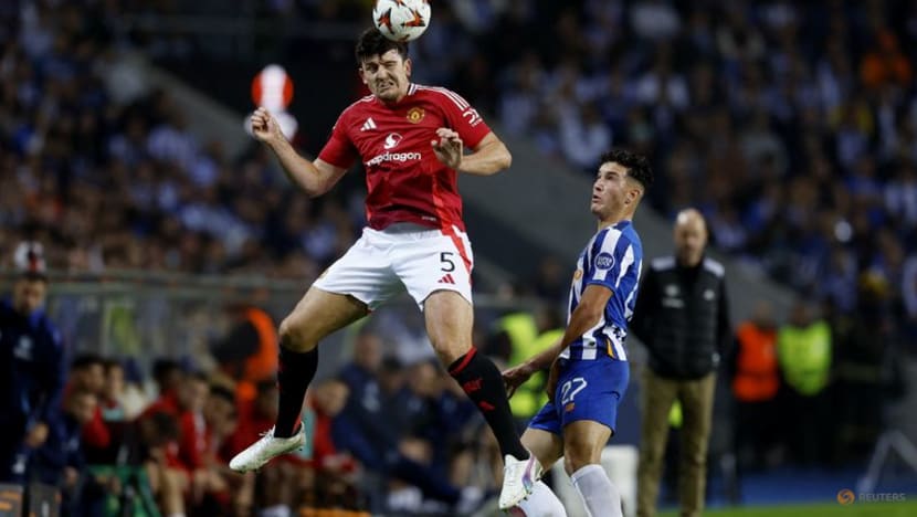 Maguire's late header earns Man United 3-3 draw at Porto Maguire's late header earns Man United 3-3 draw at Porto