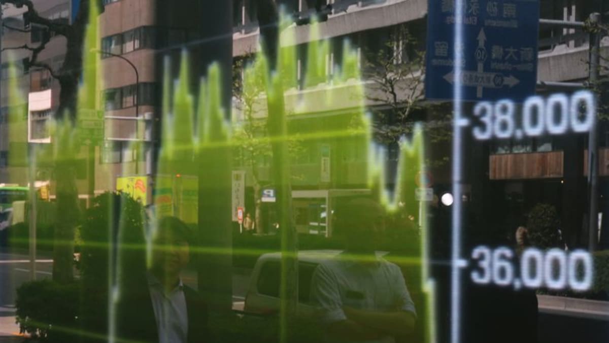 Asia shares struggle, dollar soars on lowered Fed rate cut bets