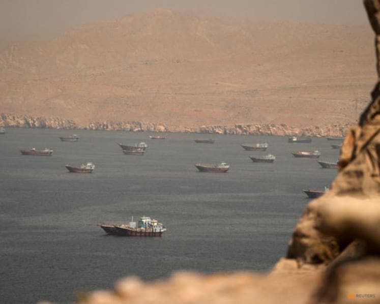 Oil settles lower, but remains near one-month high on US-Iran tension