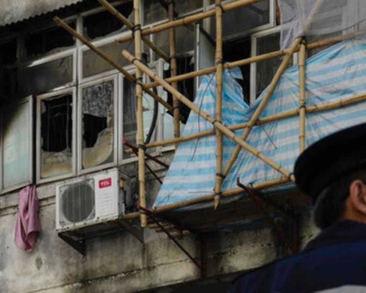 Fire in Hong Kong apartment building kills 7, injures 11