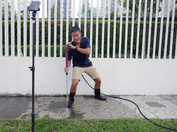 How this young 'neighbourhood celebrity' in Marine Parade is turning power washing into street art