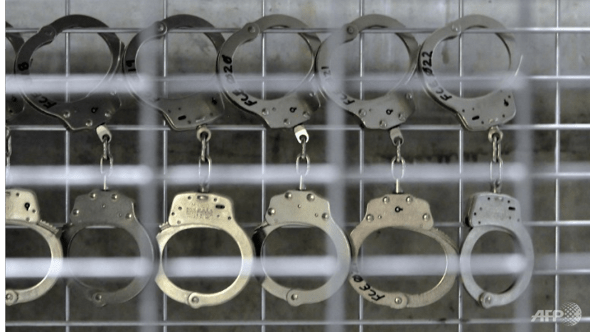 Two former prison officers charged after sharing confidential information with inmate