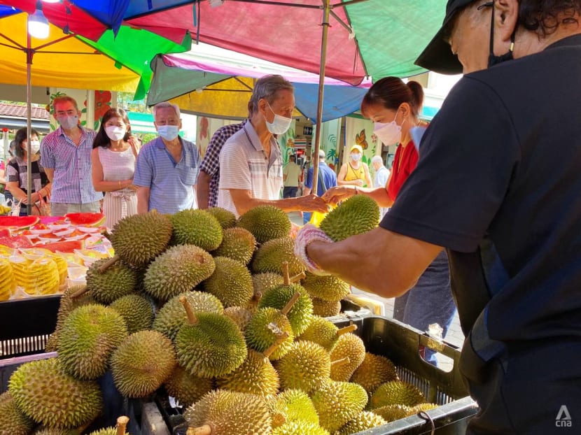 Greater durian crop sees sellers lowering prices, giving them away for free