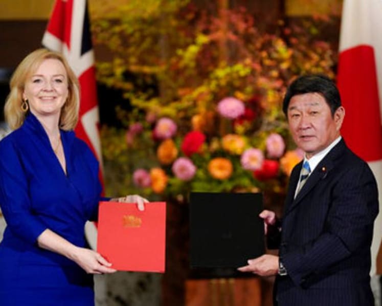 Japan, Britain sign free trade deal for post-Brexit era