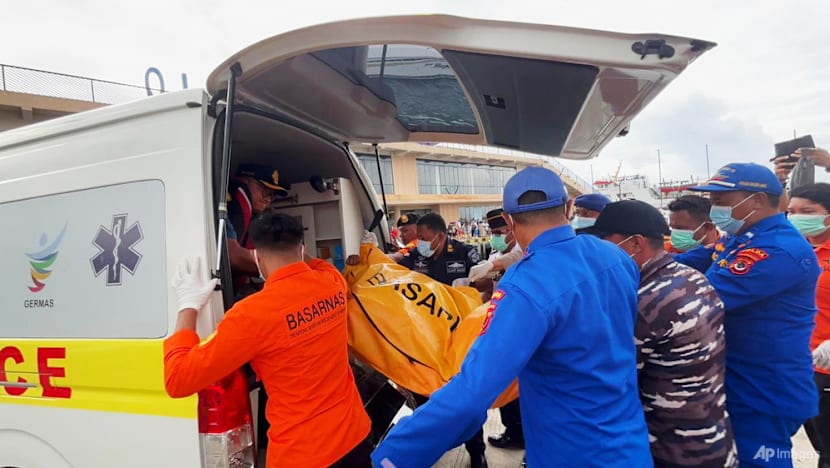 Indonesian rescuers find a body while searching for Valencia coach and 3 children