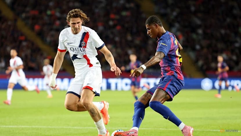 Depleted PSG battle back to earn gritty 2-1 win at Barcelona