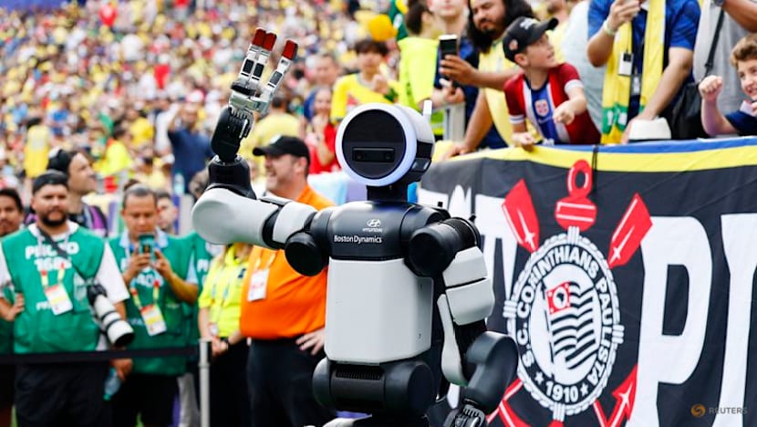 Atlas, the humanoid robot, delivers match ball at World Cup