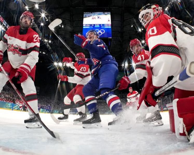 Ice hockey-Slovakia win group, US beat Denmark, Finland, Latvia notch wins