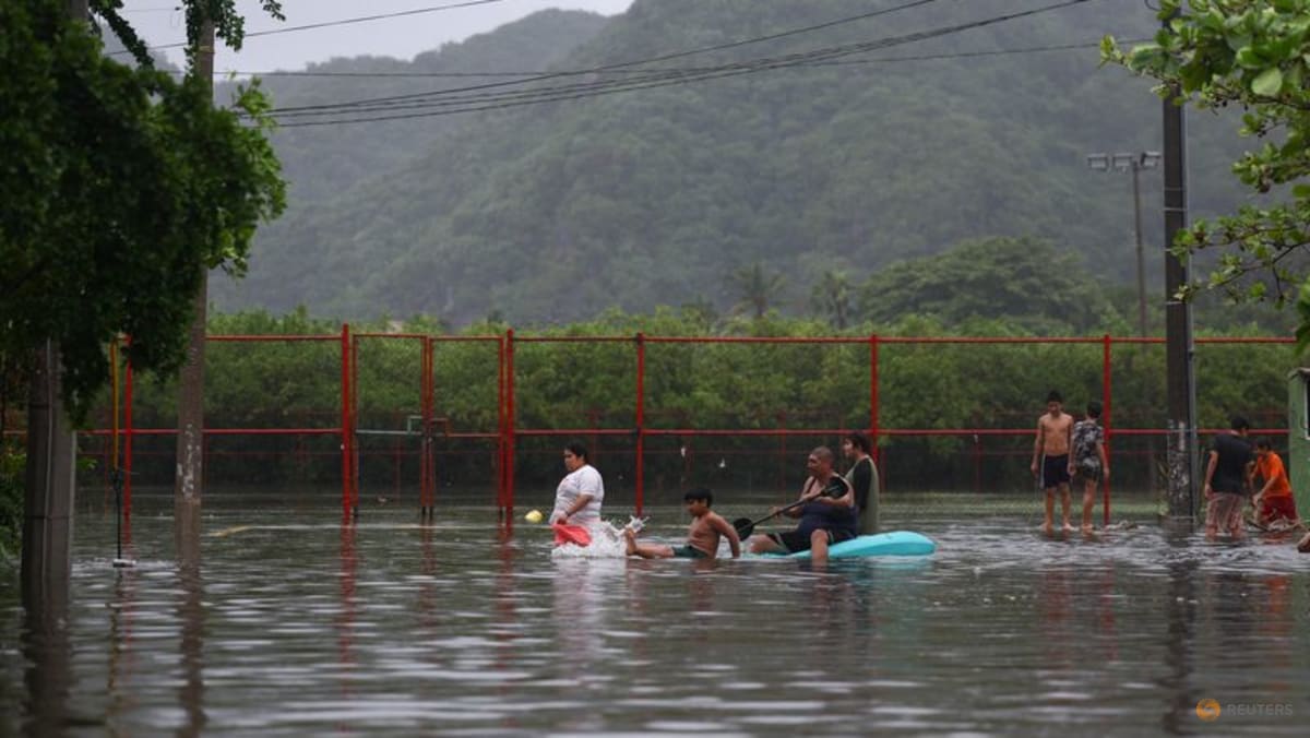 Hurricane Simon weakens to Category 3 as rains flood Mexico's Pacific coast 