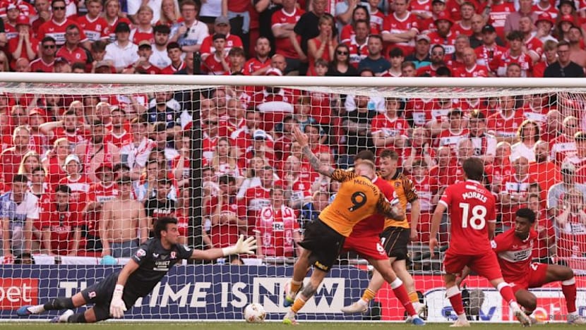 Hull back in Premier League after McBurnie's last-gasp playoff winner