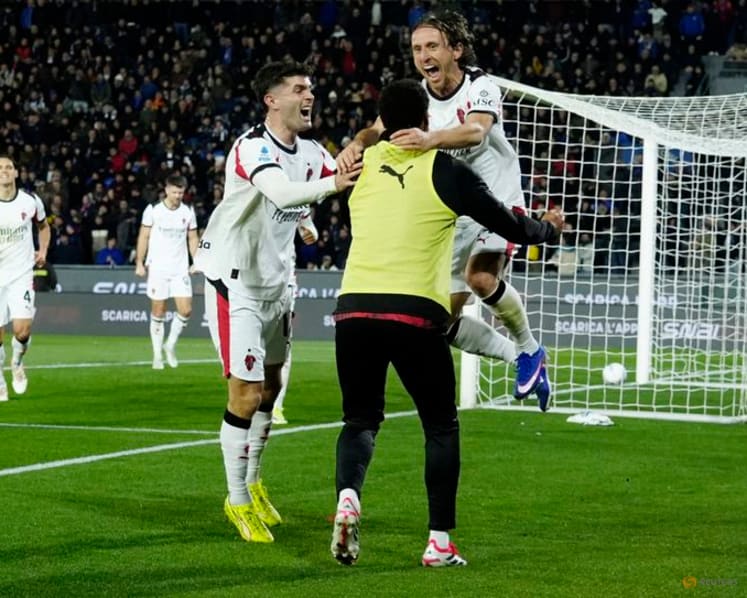 Modric nets late winner as Milan survive scare at Pisa