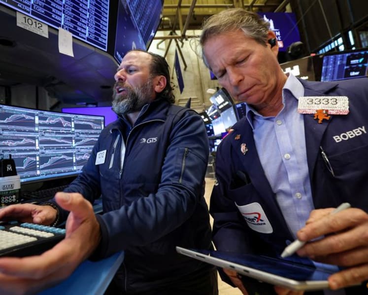 US stocks close below record highs, world indexes set for double-digit 2025 gains
